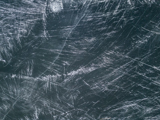 Aerial view on ice texture on the surface of the ice on a lake