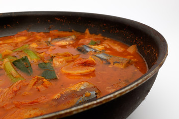 Saury kimchi stew on white background