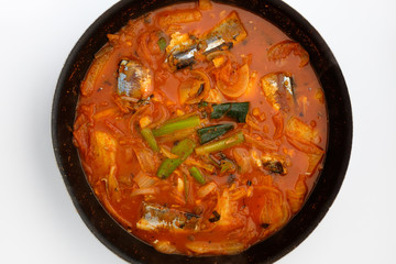 Saury kimchi stew on white background