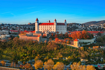 Fototapeta premium Bratislava castle over Danube river after sunset in the Bratislava old town, Slovakia