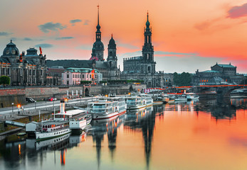 Fototapeta premium Dresden city skyline at Elbe river and Augustus bridge at sunset, Dresden, Saxony, Germany