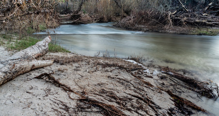 Small waterfall in a river with slow exposure