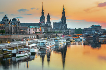 Dresden city skyline at Elbe river and Augustus bridge at sunset, Dresden, Saxony, Germany