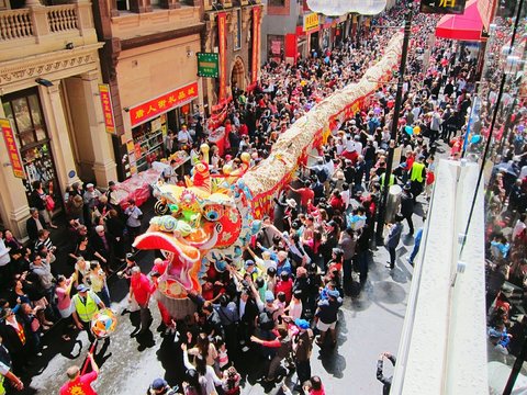 High Angle View Of Dragon Dancer On Street During Chinese New Year