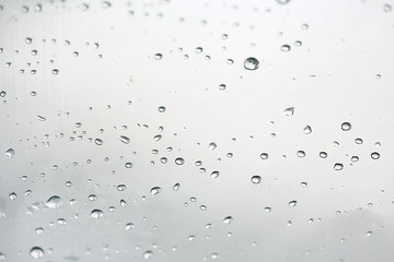 abstract drops glass background / texture fog rain, seasonal background, clear glass with water