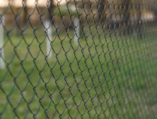 tennis net on green grass