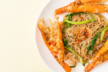 Stir-fried rice vermicelli and water mimosa with river prawns