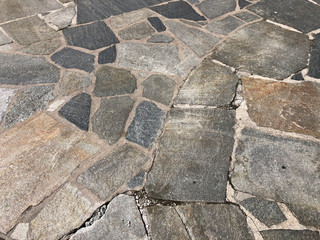 old stone pavement close-up. Background. Top view. Copy space