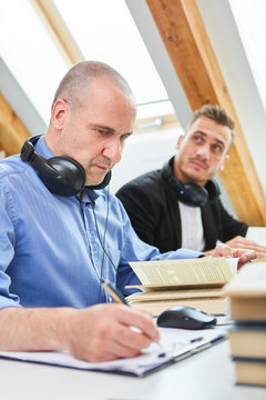 Two men in an exam or exam
