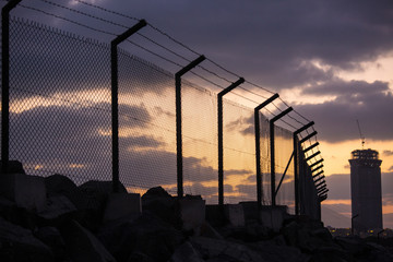 Barbed Fence Sunset against Low Cloud 2of2
