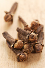 spice clove on a wooden background
