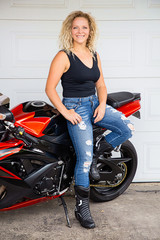 Plakat Young woman motocyclist