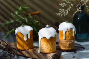 Traditional Easter bread or cake, decorated with white icing. Easter concept. Copy space.