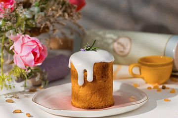 Traditional Easter bread or cake, decorated with white icing. Easter concept. Copy space.