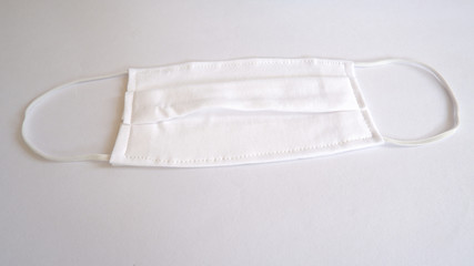 White Color cloth mask on white background