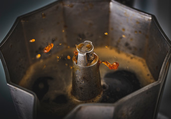 Moka pot preparing fresh coffee. Closeup photography