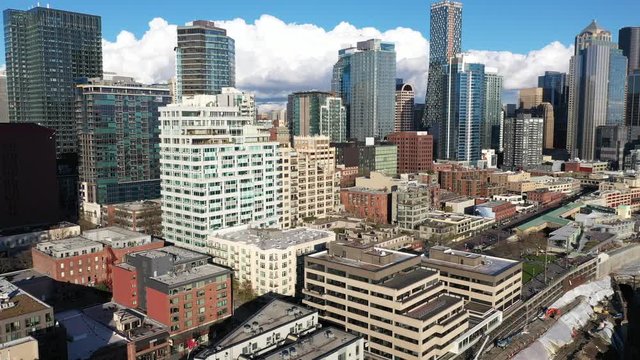 Drone footage of the empty Seattle downtown, Pike Place Market, high-rise apartments and offices near Alaskan Way during the COVID-19 pandemic
