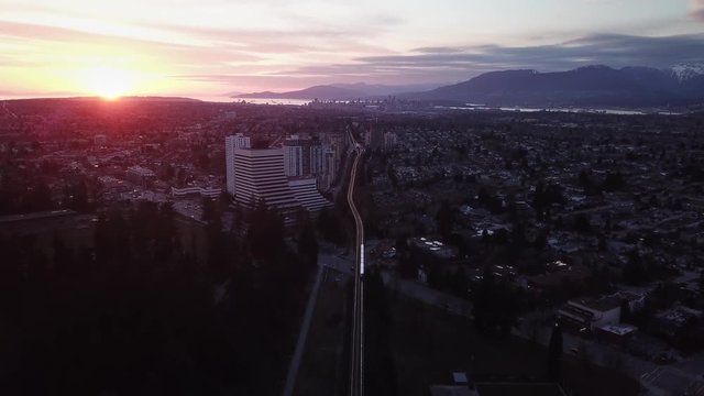 Cinematic view of the Sky-train heading to downtown Vancouver
