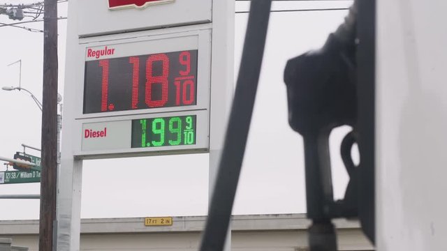Digital sign for cheap gasoline and diesel prices near hand pump