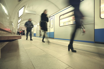 crowd of people metro in motion blurred, abstract background urban traffic people