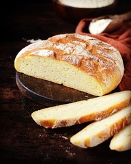 Homemade corn bread on a dark wooden table