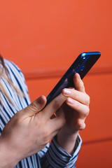 smartphone in female hands