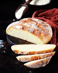 Homemade corn bread on a dark wooden table