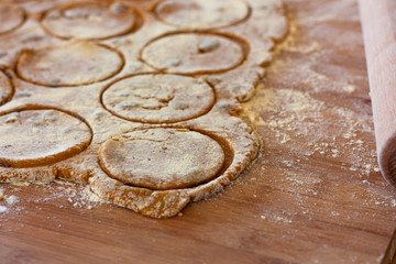 Homemade dough gluten free chikpea flour chip cookies on the baking sheet ready for the oven for baking.Gluten free chikpea flour sweet dough for homemade tea pies. Selective focus