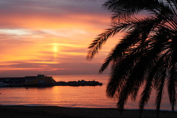 Fototapeta na wymiar Barceloneta beach at sunrise in Barcelona, Spain