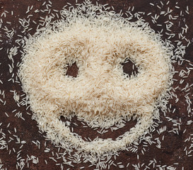 white basmati rice on a brown background