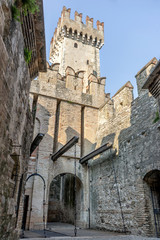 Fototapeta na wymiar Tower of the Scaliger Castle in Sirmione in Italy
