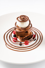 brownie with ice cream and berries