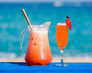 champagne cocktail with fruits with orange juice