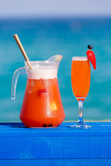 champagne cocktail with fruits with orange juice