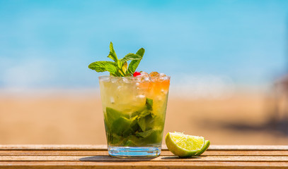  Cocktail Mojito with the sea in the background