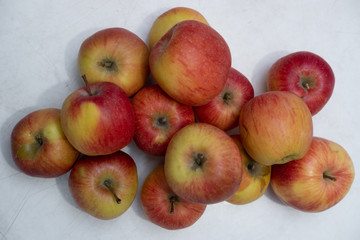 Lots of red and yellow apples