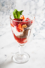 summer dessert with strawberries and ice cream