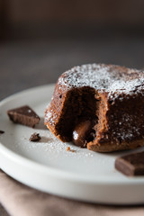 Delicious fresh fondant with hot chocolate centre on the plate. Lava cake recipe, menu. Close up