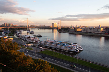sunset view of the neva river and the bridge