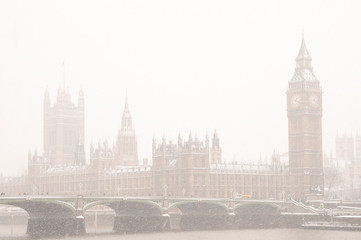Big Ben and Houses of Parliament in the winter snow, London, UK