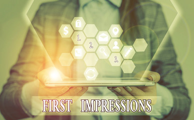 Conceptual hand writing showing First Impressions. Concept meaning first consideration or judgment...