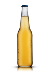 small clear bottle with beer