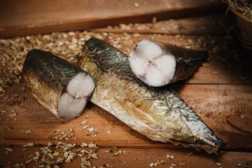 view of smoked fish on wooden surface delicious