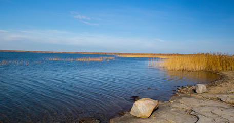 rocky shore of the reservoir