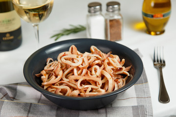 portion of cooked squids served on table delicious