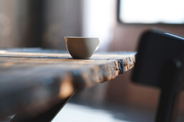 cup on wooden table