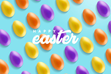 Creative minimal Happy Easter layout colorful eggs and the text message ''Happy Easter'' together on the sweet blue background.