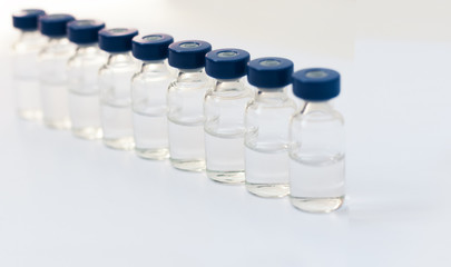 injection ampoules for vaccination on a white background, healthcare coronavirus, cancer, painand treatment, pharmaceutical medicine concept .