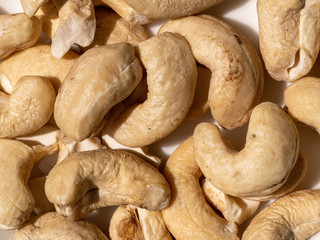 Background made of raw cashew nuts.Top view.