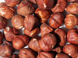 Hazelnut pile closeup. Hazelnut photo background.